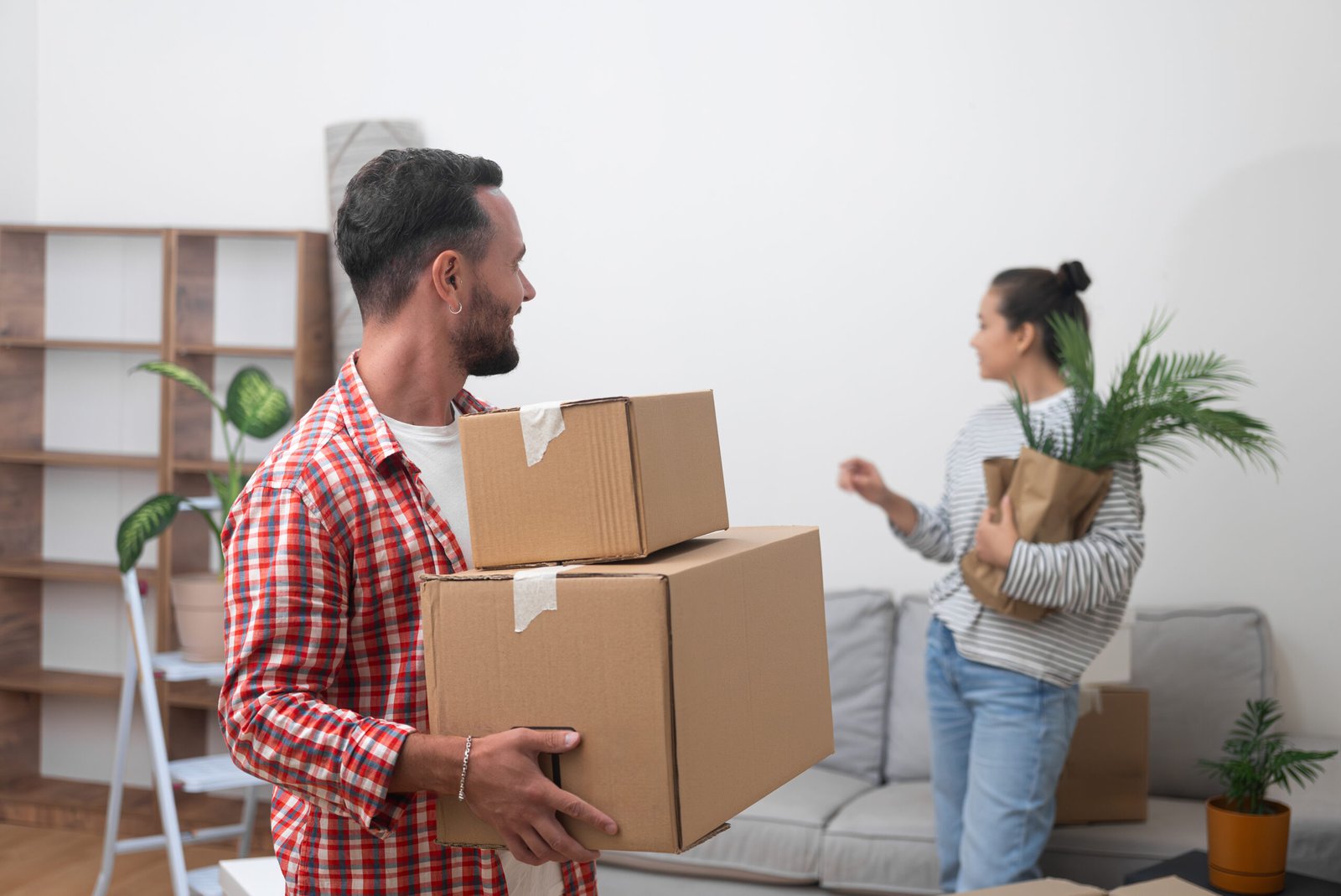 A young couple preparing for their move